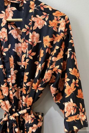 black kimono with orange floral design