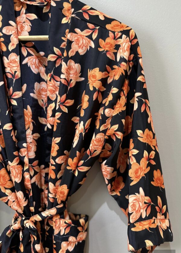 black kimono with orange floral design